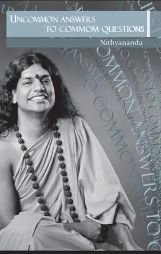 Book cover for Uncommon Answers to Common Questions by Nithyananda, shown as a graphic with a black-and-white photograph of a smiling man with long hair and a red bindi, wearing a loose cream-colored robe and a long necklace of dark rudraksha beads. He sits with his hands folded in his lap against a grey backdrop. A pale blue title band across the top reads the book title, and faint repeated words in the background spell out the phrase common questions and answers. The image is a book cover design rather than a candid photo of an event.