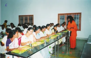 Swamiji Serving Participants - 03b_watermark.jpg