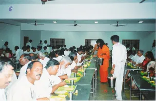 Swamiji Serving Participants - 01a_watermark.jpg
