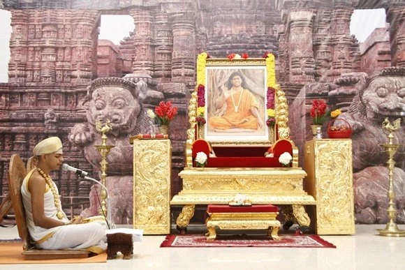 Paduka Puja being offered to the sacred padukas of Paramahamsa Nithyananda by devotees all around the World