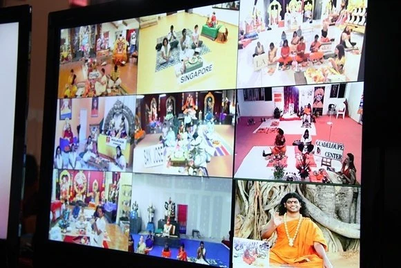 Paduka Puja being offered to Paramahamsa Nithyananda by devotees around the World
