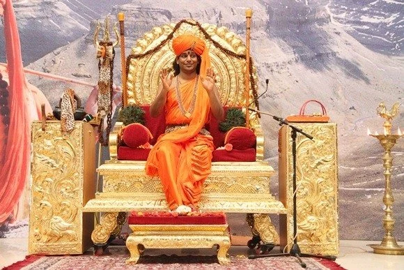 https://www.nithyananda.org/sites/default/files/photo-gallery/2011-08aug-17-nithyananda-photo-02e-swamiji-arati-raja-sabha-bidadi.JPG?1313847122
