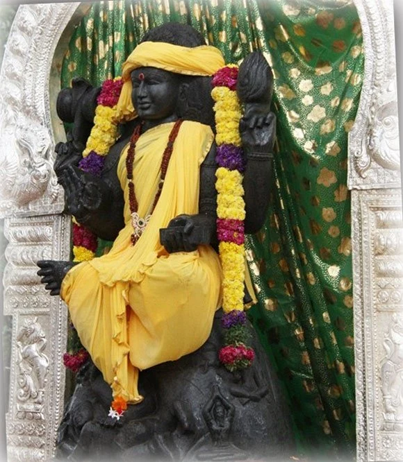 Adiguru Dakshinamurthy under the sacred banyan tree, radiating vibrant silence