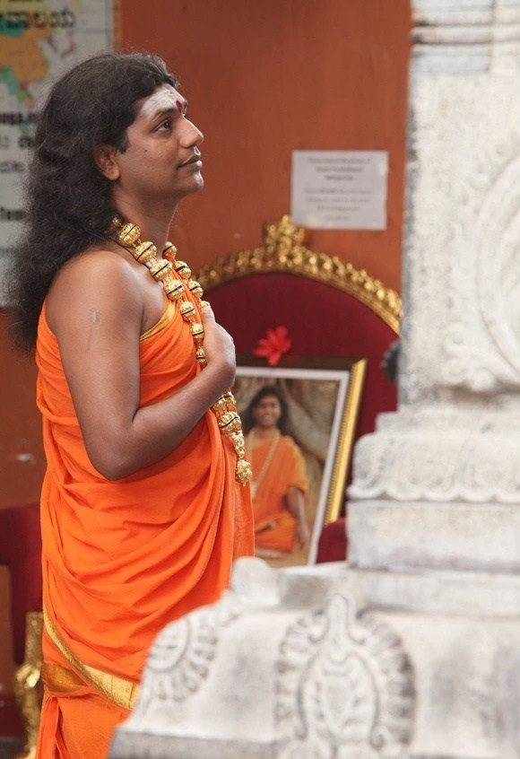 https://www.nithyananda.org/sites/default/files/photo-gallery/2011-08aug-19-nithyananda-photo-01b-swamiji-anandeshwara-temple-darshan_0_0.JPG?1313856396
