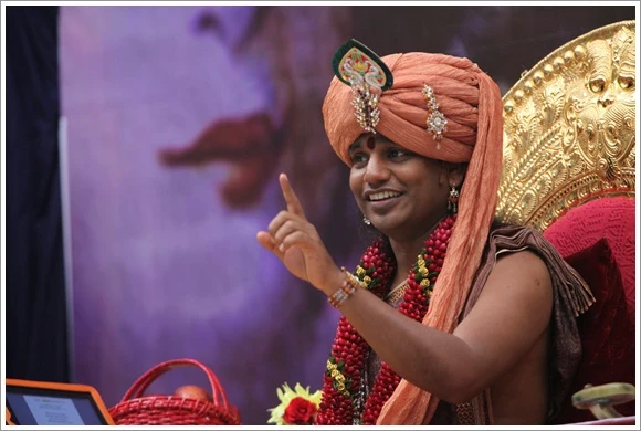 https://www.nithyananda.org/sites/default/files/photo-gallery/2011-08aug-31-nithyananda-photo-10-swamijiinaction.JPG?1314778928