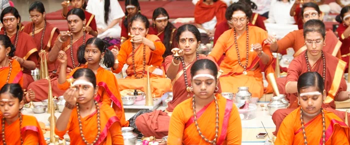 Devotees offer aarathi during Rudrabishekam