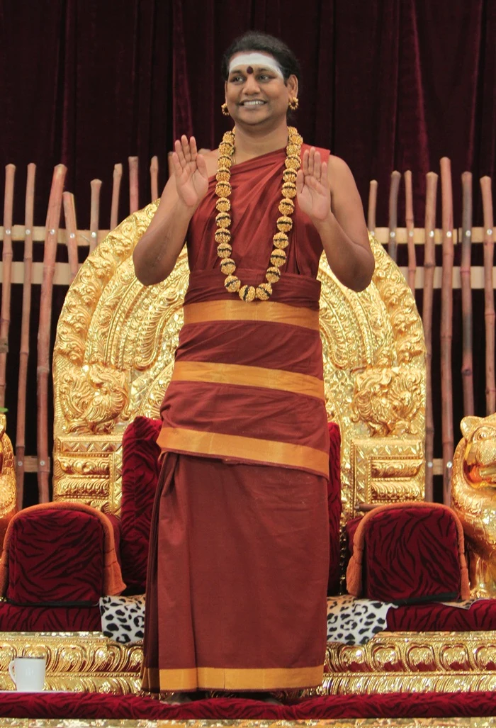 https://nithyananda.org/sites/default/files/photo-gallery/2014-10oct-09th-nithyananda-dairy_IMG_2654_bidadi-satsang-swamiji-blessings.JPG?1412851925