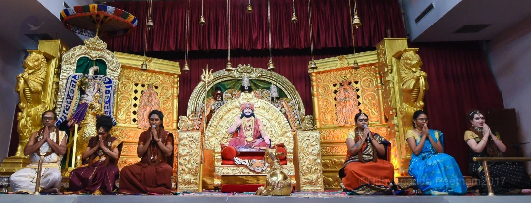 Presentation by Aadheenavasis about the glory of living around His Holiness.