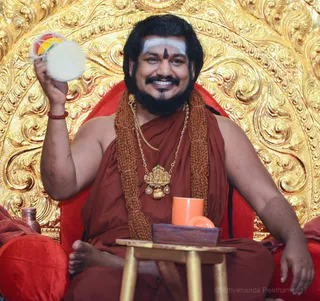 http://nithyananda.org/sites/default/files/photo-gallery/017-3mar-5th-nithyananda-diary_DSC_5287_bengaluru-aadheenam-IA-Day8-initiation-darshan-swamiji.jpg