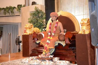 Morning pratyaksha paada puja