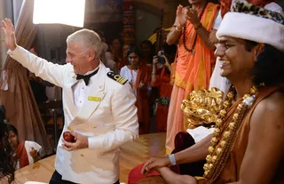 Captain of Costa Victoria gets cheered by participants as he gets darshan from Swamiji