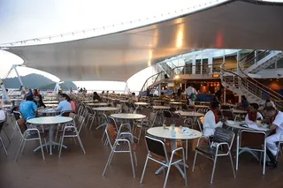 Outdoor dining area on cruise deck