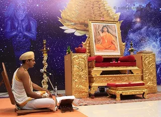 https://www.nithyananda.org/sites/default/files/photo-gallery/2011-07jul-25-nithyananda-photo-02a-nithyananda-paduka-puja-bidadi-raja-sabha.jpg?1312472132