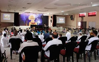 https://www.nithyananda.org/sites/default/files/photo-gallery/2011-07jul-25-nithyananda-photo-02d-nithyananda-recorded-satsang-wideangle-view-bidadi-raja-sabha.jpg?1312472178
