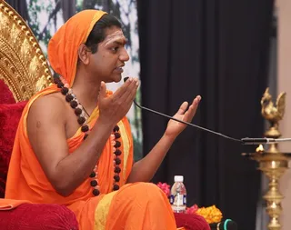 https://www.nithyananda.org/sites/default/files/photo-gallery/2011-08aug-24-nithyananda-photo-11b-swamiji-discourse.JPG?1314251971