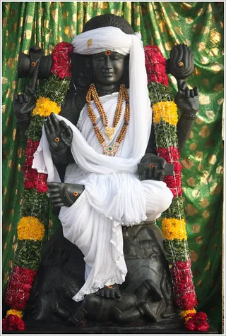 Primordial Guru Dakshinamurti shrine under the sacred Banyan tree...