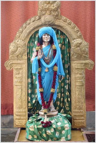 Swamijis Utsav Murti adorned beautifully in blue attire...