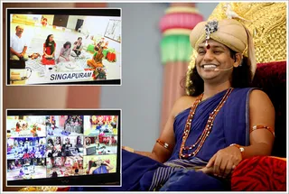 Swamiji speaks to a devotee in Singapore Singapuram satsang center...