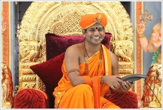 http://nithyananda.org/sites/default/files/photo-gallery/2012-01jan-22-nithyananda-photo-04%20b%20dial%20the%20avatar.JPG