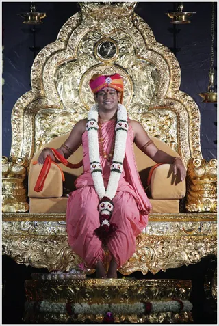 Swamiji inside the Garba Mandir for Pratyaksha Pada puja...