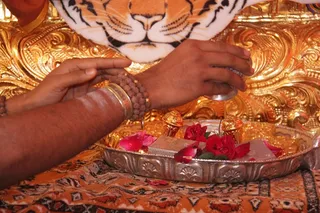 Pratyaksha pada Puja being performed to the sacred lotus feet of Swamiji