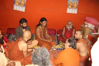 http://nithyananda.org/sites/default/files/photo-gallery/2013feb15-Nithyananda-sernior-mahanth-lalbaba-swami-talking-in-nirvani-akkada.JPG