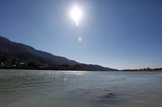 The sun shines bright on the Ganga as the Master graces Rishikesh