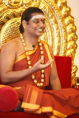 http://nithyananda.org/sites/default/files/photo-gallery/2014-01jan-24th-nithyananda-diary_IMG_8318_haridwar-nithya-satsang_0.JPG