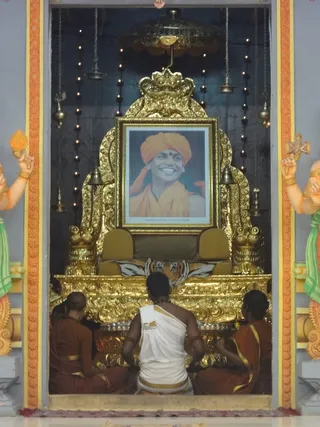 Paduka Puja being offered in gratitude to the Gurumoorthi of Nithyananda