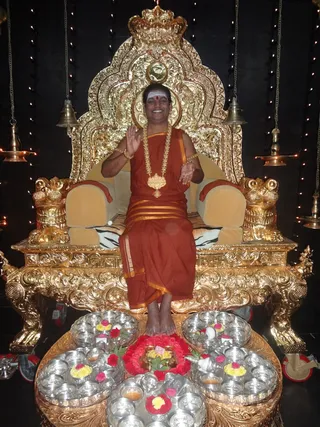 Pada Puja being performed to Swamiji as an expression of gratitude by devotees