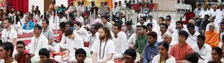 Devotees glued to the Satsang by Swamiji