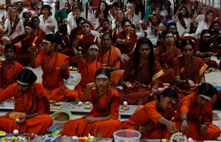 http://nithyananda.org/sites/default/files/photo-gallery/2014-02feb-13th-nithyananda-diary_IMG_9590_bidadi-padukapuja-devotees-offering_0.JPG
