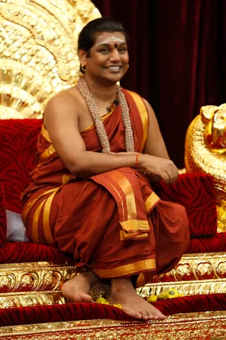 http://nithyananda.org/sites/default/files/photo-gallery/2014-02feb-15th-nithyananda-diary_IMG_9716_bidadi-swamiji-kalpataru-darshan_0.JPG