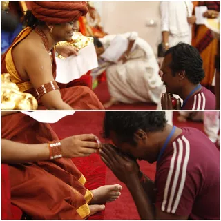 Swamiji gracing the Kalpataru Darshan to all the devotees present physically