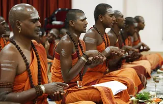 Brahmacharis doing padukapuja