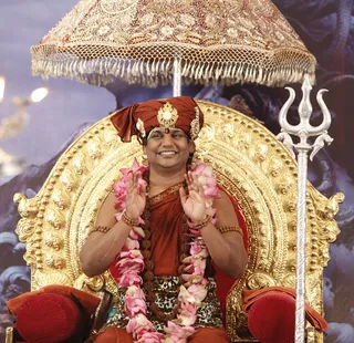 http://nithyananda.org/sites/default/files/photo-gallery/2014-05may-11-nithyananda-diary_MG_8324_Padapuja.JPG