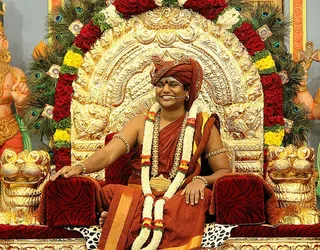 http://nithyananda.org/sites/default/files/photo-gallery/2014-06jun-12-nithyananda-diary_IMG_4761_bidadi-nithyananda-poornima_5.JPG