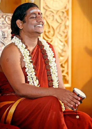 http://nithyananda.org/sites/default/files/photo-gallery/2014-06jun-15-nithyananda-diary_IMG_4514_hyderabada-kalpataru-darshan_0.JPG