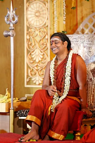 http://nithyananda.org/sites/default/files/photo-gallery/2014-06jun-15-nithyananda-diary_IMG_4519_hyderabada-kalpataru-darshan_0.JPG
