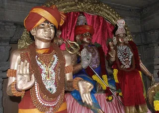 Nithyanandeshwara, Nithyanandeshwari and Pratyaksha Moorthi of Bhagavan Sri Nithyananda Paramashivam at the temple sanctum