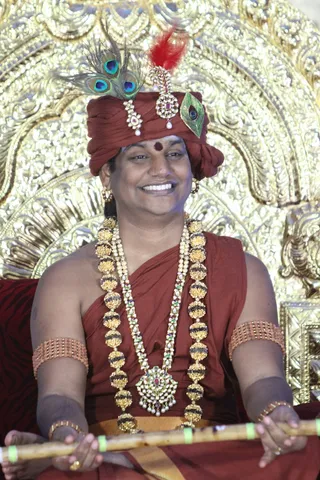 https://nithyananda.org/sites/default/files/photo-gallery/2014-08aug-17-nithyananda-diary_IMG_4475_bidadi-krishna-jenmashtami-morning-nithya-satsang_0.JPG