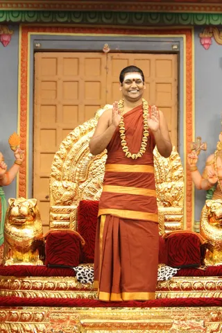 https://nithyananda.org/sites/default/files/photo-gallery/2014-09sep-18-nithyananda-diary_IMG_7316_bidadi-swamiji-blessing_0.JPG?1411159667