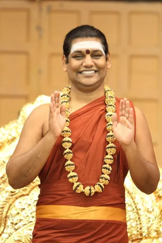 https://nithyananda.org/sites/default/files/photo-gallery/2014-09sep-18-nithyananda-diary_IMG_7317_bidadi-swamiji-blessing_0.JPG?1411159675