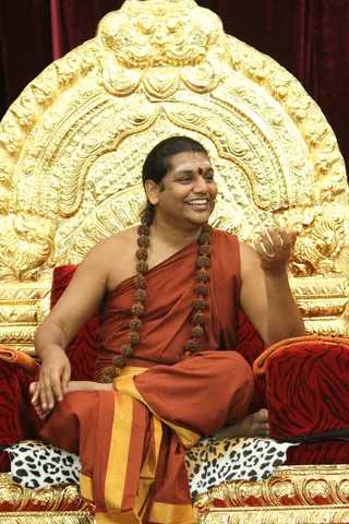 https://nithyananda.org/sites/default/files/photo-gallery/2014-09sep-20-nithyananda-diary_IMG_7768_bidadi-ndy-nithya-dhyaan-yoga-session-swamiji.JPG?1412412390