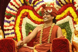 https://nithyananda.org/sites/default/files/photo-gallery/2014-09sep-26th-nithyananda-diary_IMG_9481_bidadi-navaratri-celebration-swamiji.JPG?1411813377