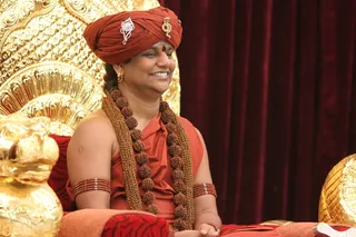 https://nithyananda.org/sites/default/files/photo-gallery/2014-11nov-30th-nithyananda-diary_IMG_0018_bidadi-swamiji-dial-the-avatar.JPG?1417371261
