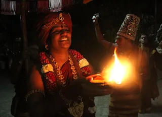 http://nithyananda.org/sites/default/files/photo-gallery/2014-12dec-05th-nithyananda-diary_IMG_0554_bidadi-karthjgai-deepam_0.JPG