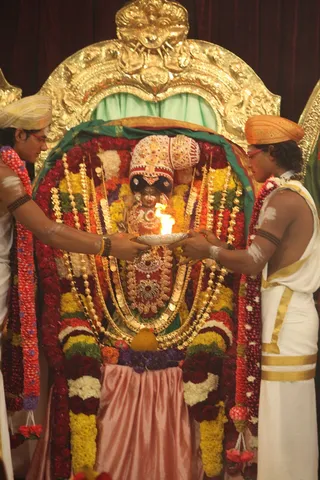 http://nithyananda.org/sites/default/files/photo-gallery/2015-01jan-09th-nithyananda-diary_IMG_4050_bidadi-kalyanotsava-deity-devi-meenakshi-arati_0.JPG