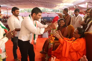 http://nithyananda.org/sites/default/files/photo-gallery/2015-01jan-11th-nithyananda-diary_IMG_4930_bidadi-evening-culturals-swamiji-blessing_0.JPG