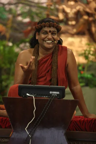 http://nithyananda.org/sites/default/files/photo-gallery/2015-01jan-25th-nithyananda-diary_IMG_1375_bidadi-nky-shivoham-process-session-swamiji-musical-instruments-electronic-pad.JPG